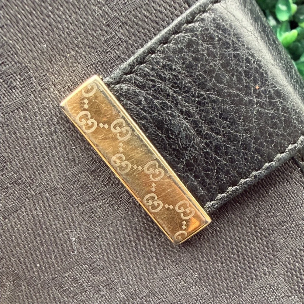 Gucci Authentic Black Embossed Clutch Wallet